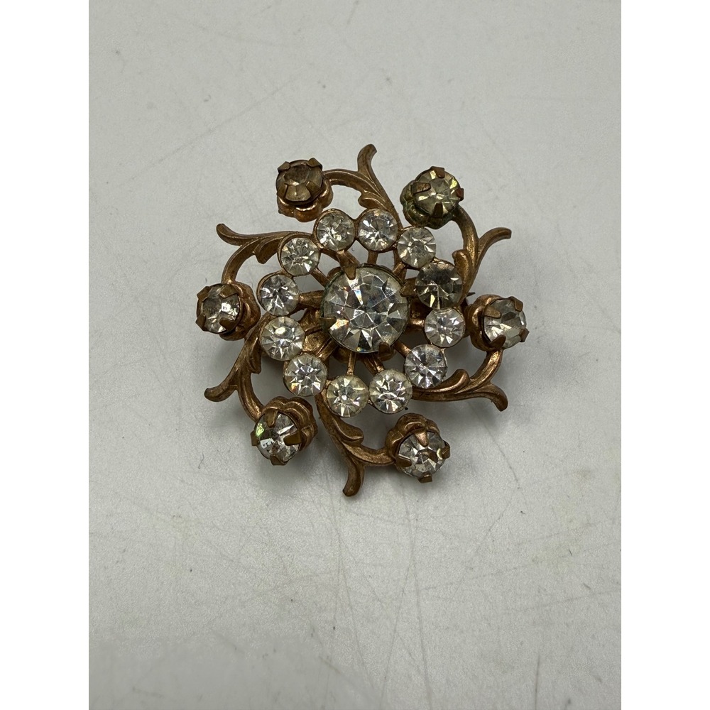 Vintage Gold Tone Clear Rhinestone Floral Sunburst Brooch Pin Round 1.25 Inch